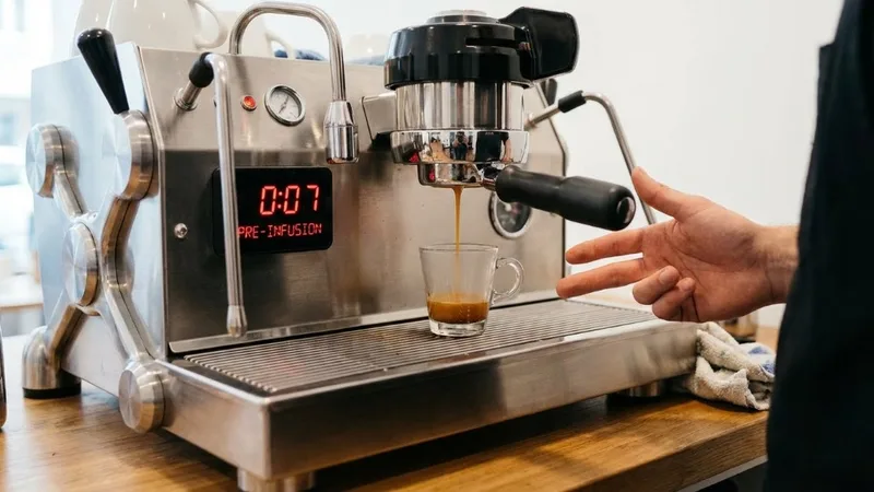 Digital timer showing exactly 7 seconds of pre-infusion time on an espresso machine display